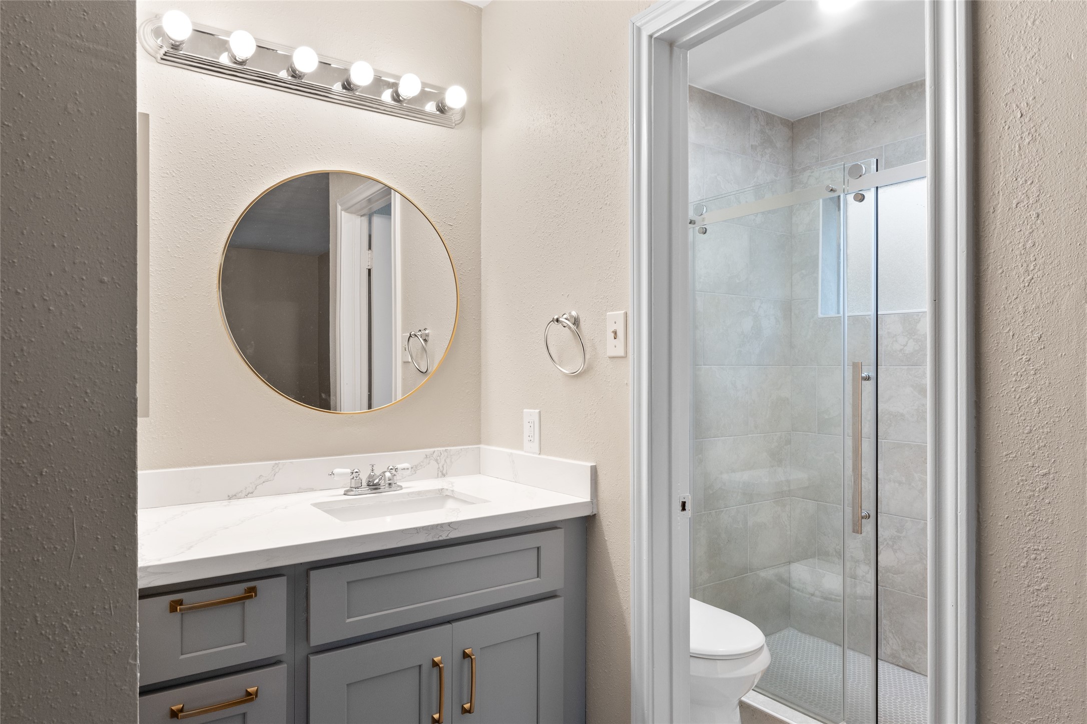 8314 Poplar Ridge Lane Humble, TX 77338 - Photo 17 of 20 a bathroom with a sink a toilet and shower