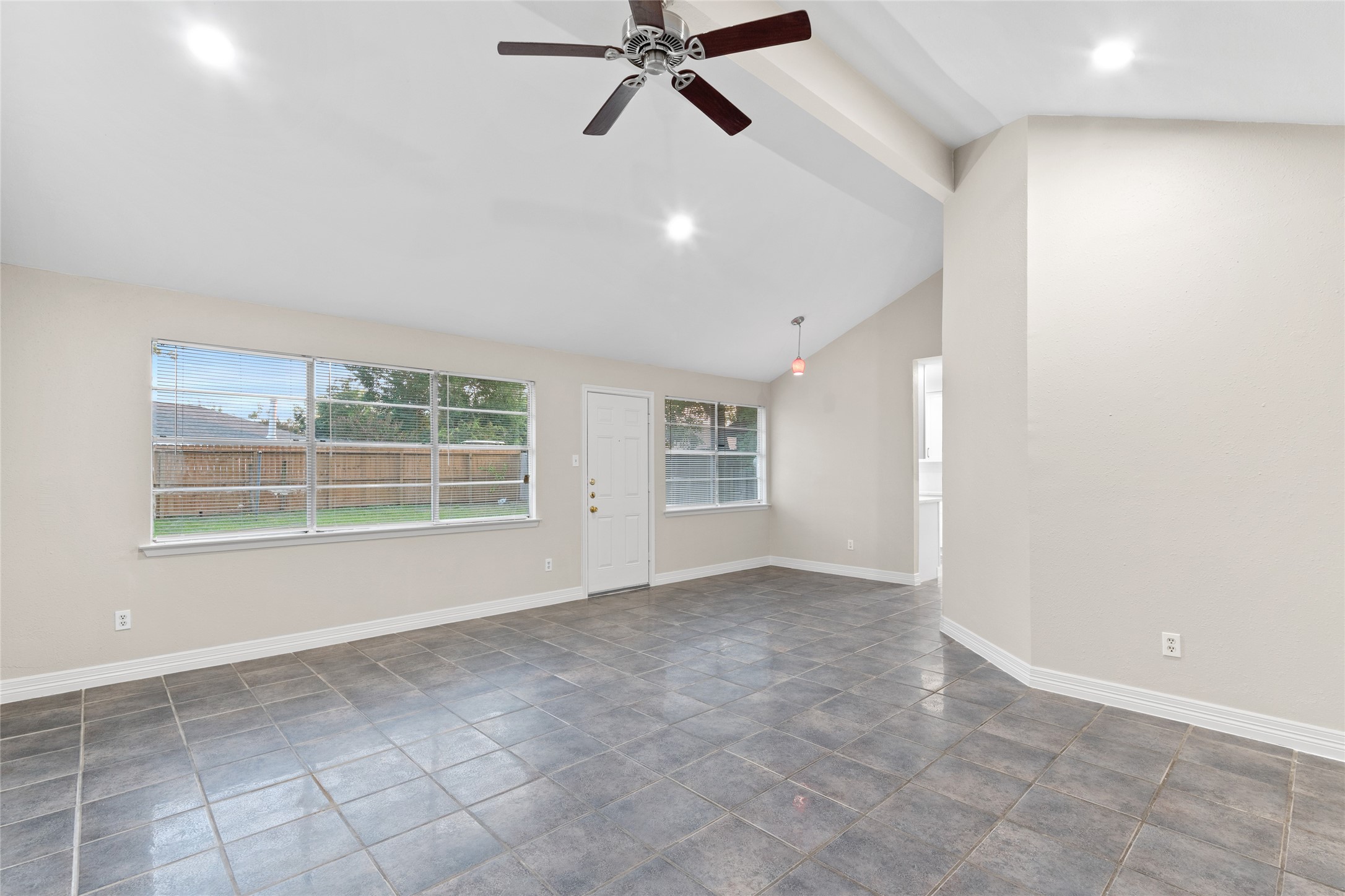8314 Poplar Ridge Lane Humble, TX 77338 - Photo 6 of 20 a view of an empty room with a window