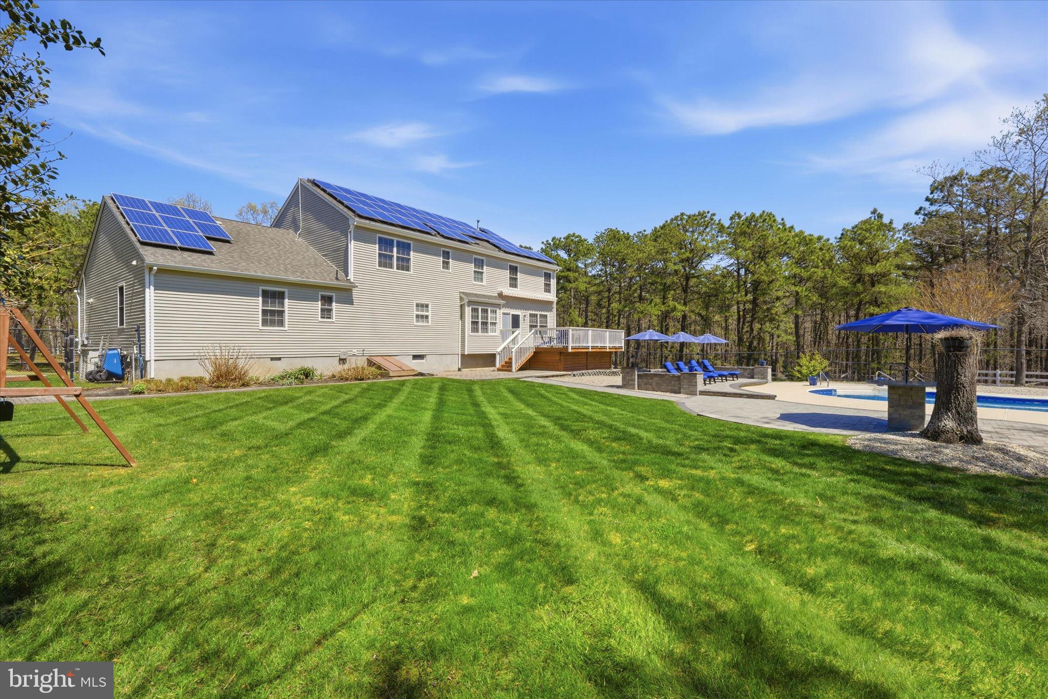 176 Warren Grove Road Barnegat, NJ 08005 - Photo 54 of 71 a house view with a sitting space and garden