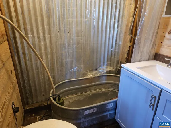 a bathroom with a sink and a toilet