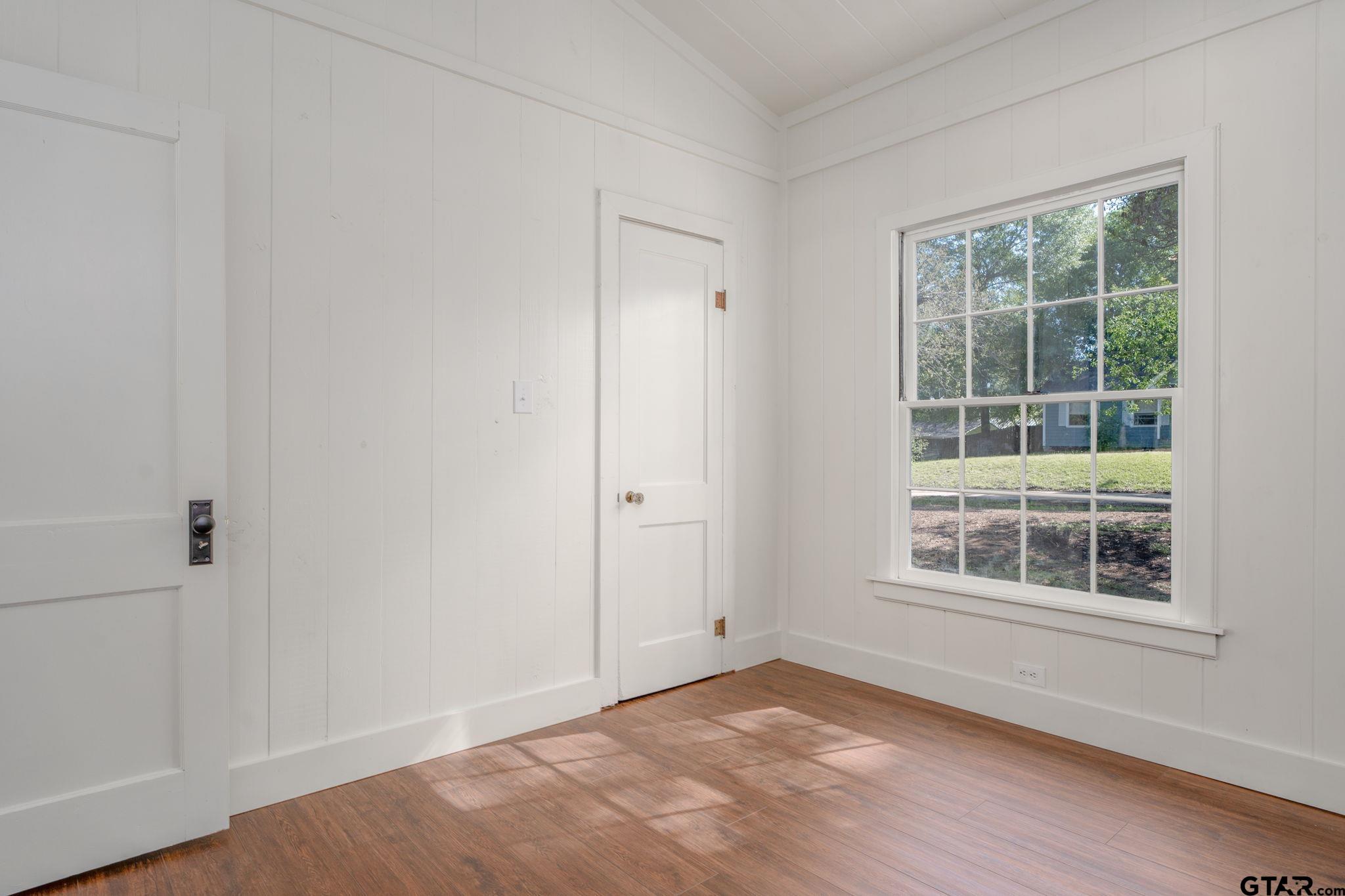 605 East Calvert Street Troup, TX 75789 - Photo 19 of 23 a view of an empty room with a window