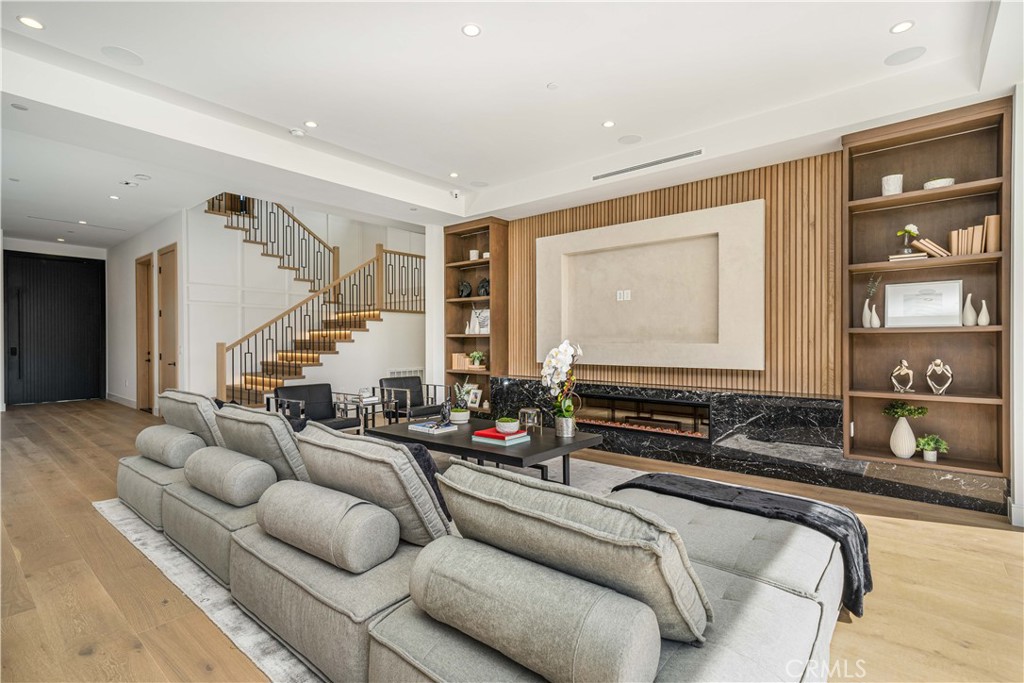 4919 Mammoth Avenue Sherman Oaks, CA 91423 - Photo 19 of 29 a living room with furniture and a large window
