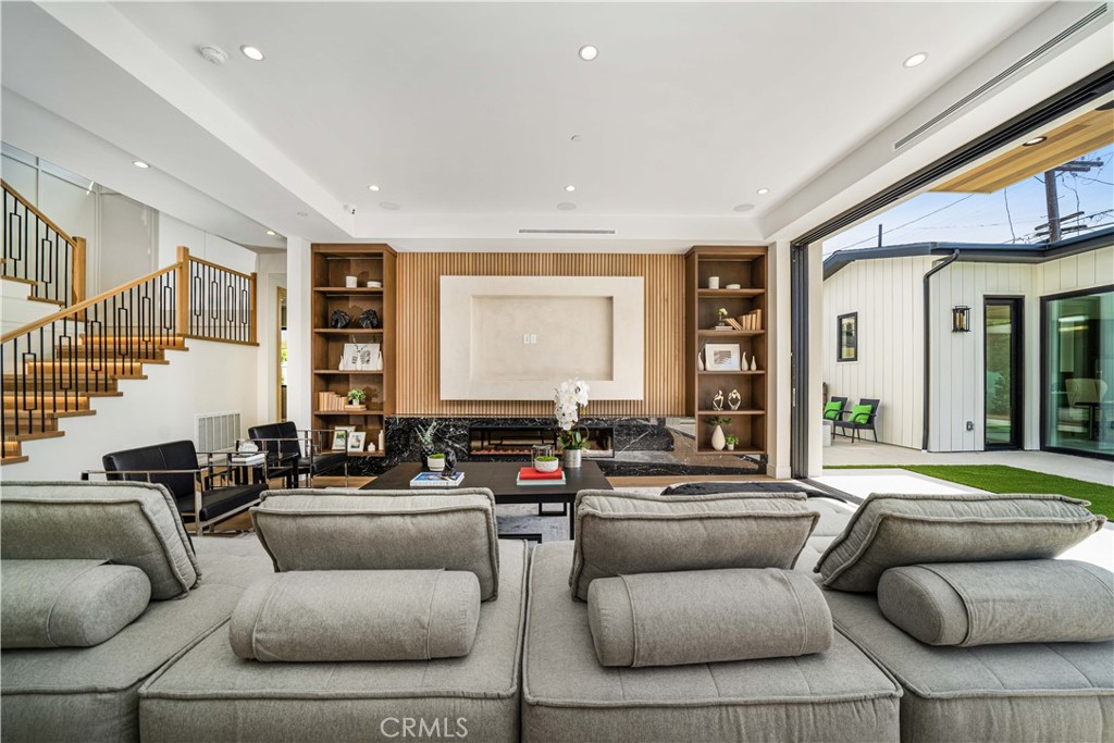 4919 Mammoth Avenue Sherman Oaks, CA 91423 - Photo 20 of 29 a living room with furniture and a large window