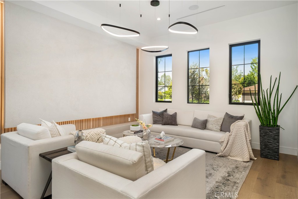4919 Mammoth Avenue Sherman Oaks, CA 91423 - Photo 10 of 29 a living room with furniture and a large window