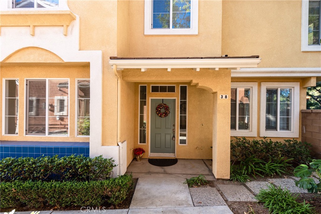 front view of a brick house with a windows