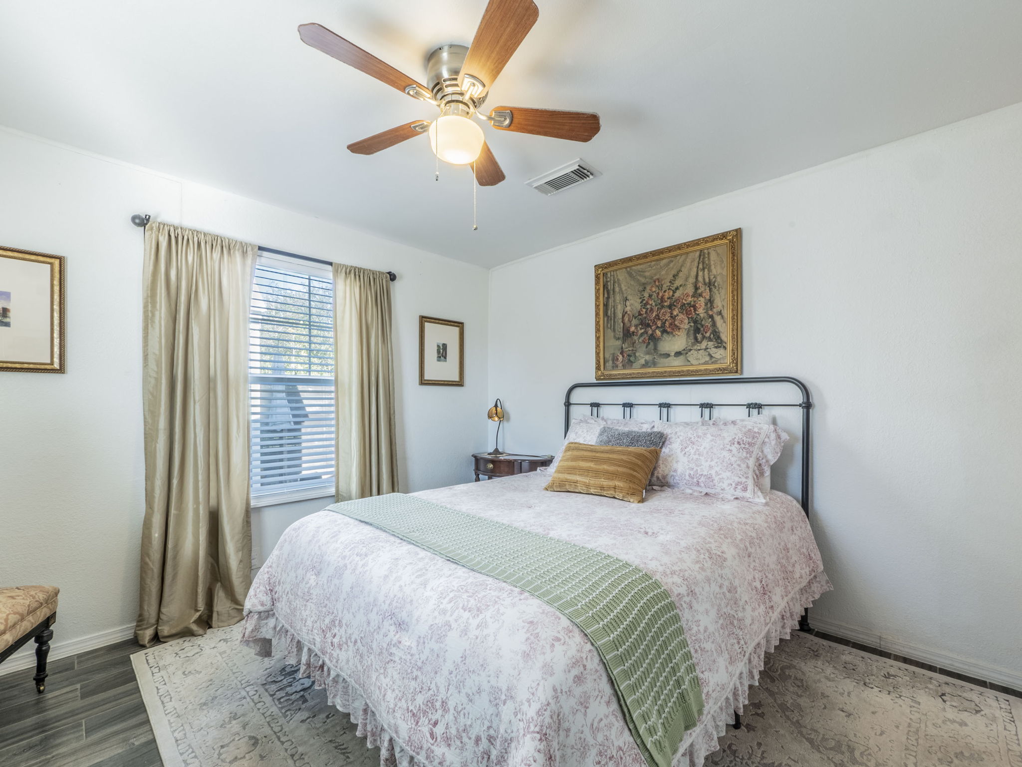 11012 3rd Street Jonestown, TX 78645 - Photo 11 of 26 The primary bedroom is located towards the back of the home offering maximum privacy.