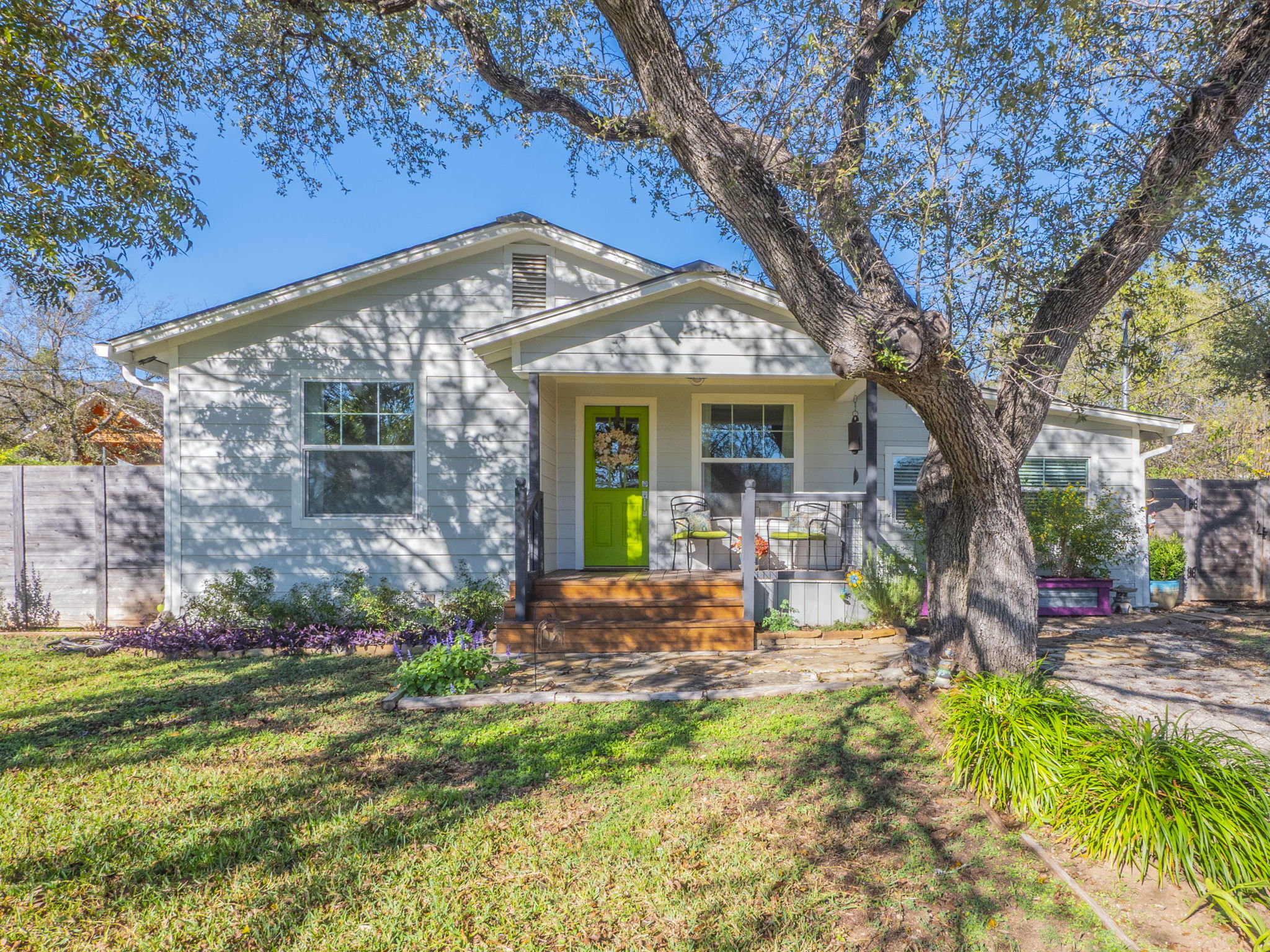 11012 3rd Street Jonestown, TX 78645 - Photo 2 of 26 Welcome to 11012 3rd St. in Jonestown! Enjoy your morning coffee on your cozy front porch as you wave hello to your neighbors.