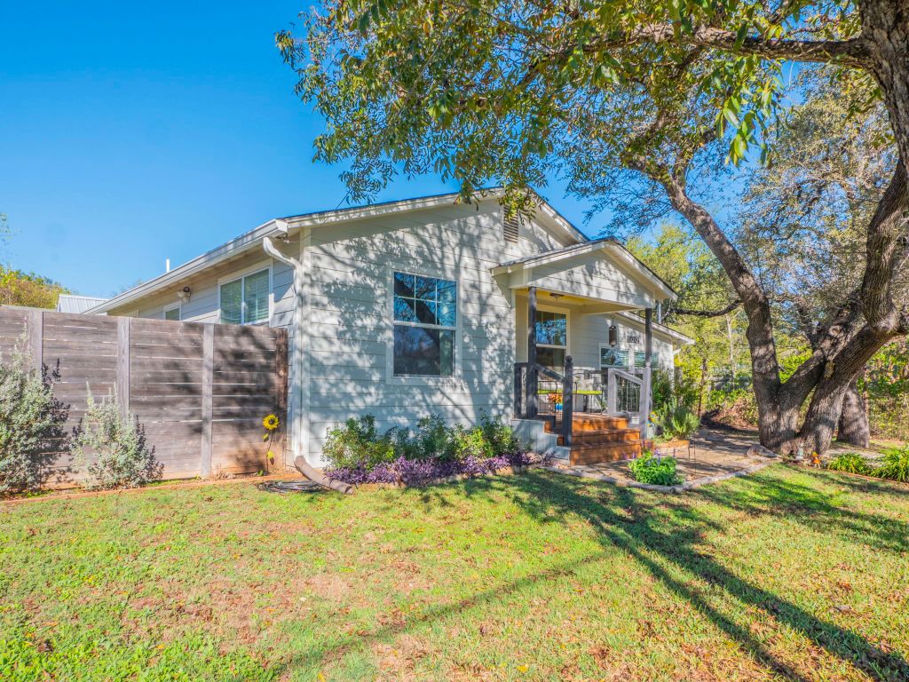 11012 3rd Street Jonestown, TX 78645 - Photo 2 of 26 a view of a house with a yard and sitting area