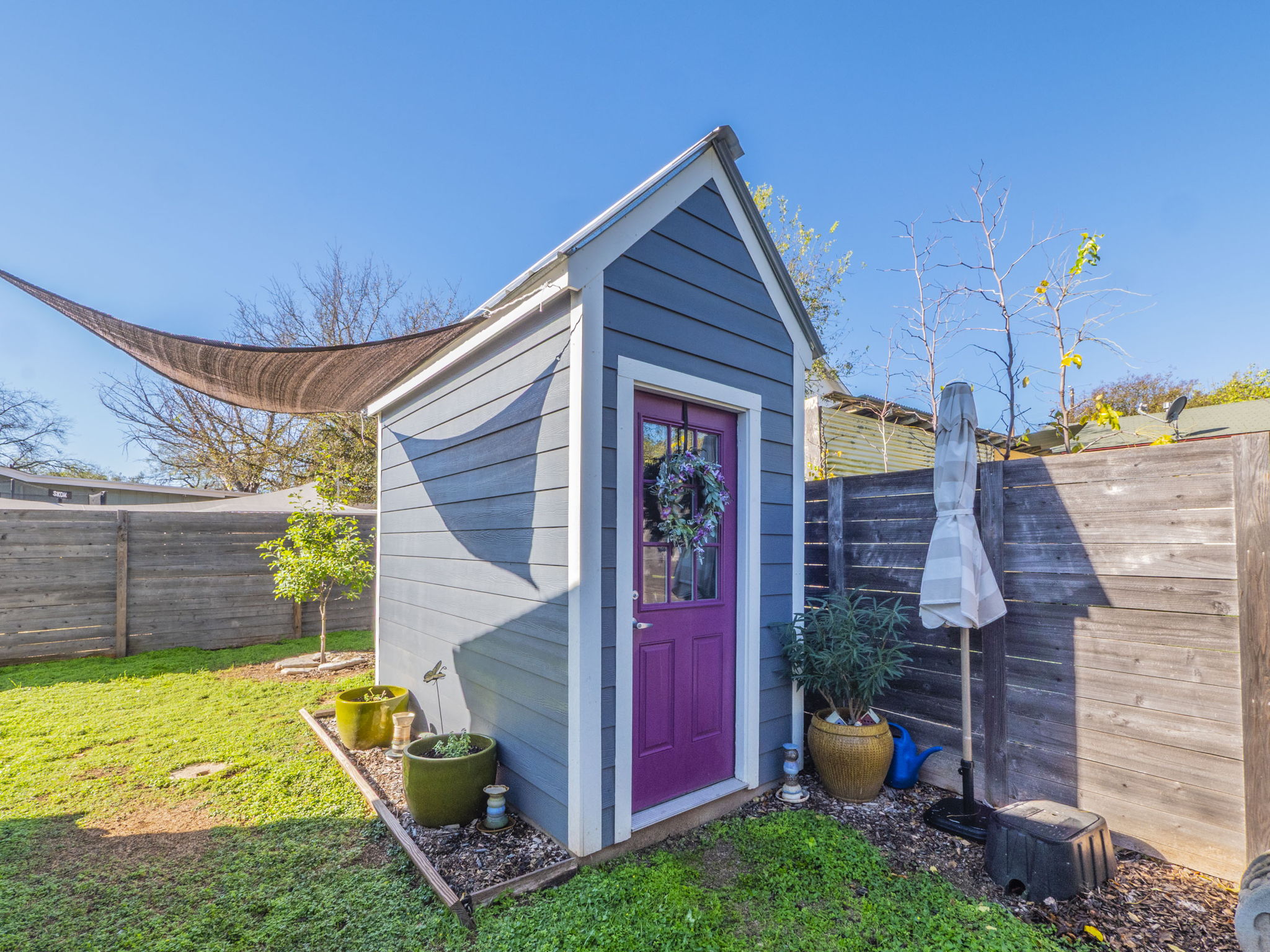 11012 3rd Street Jonestown, TX 78645 - Photo 23 of 26 This modern garden shed was built in 2023 and is perfect for storing garden tools or other items.