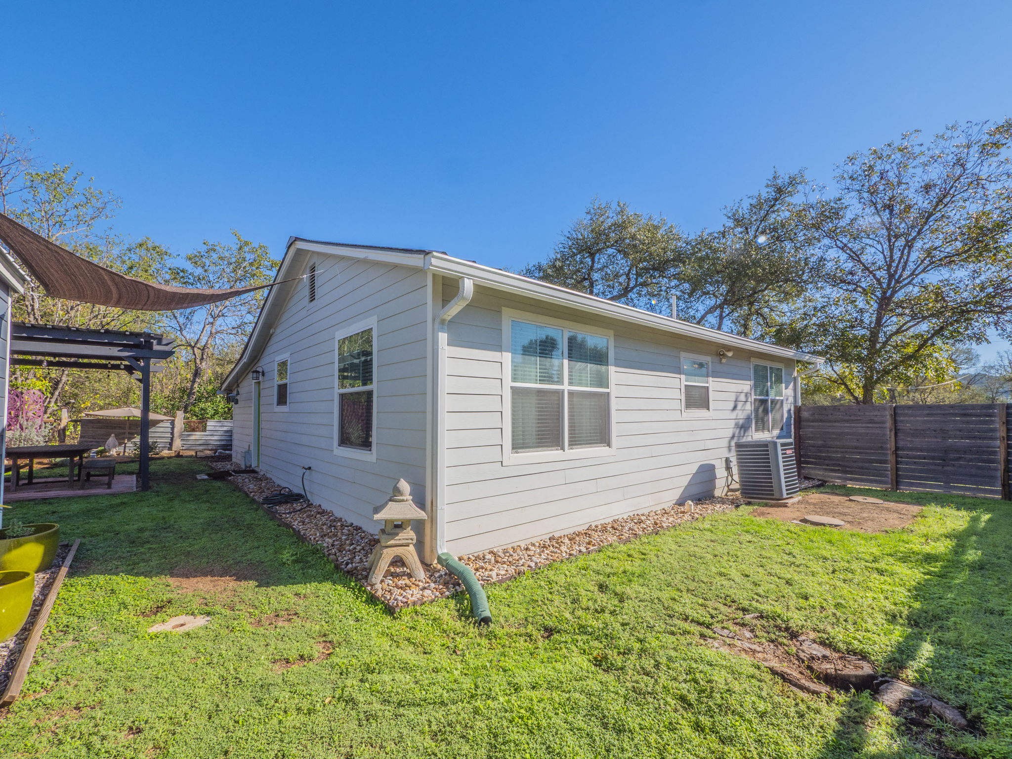 11012 3rd Street Jonestown, TX 78645 - Photo 24 of 26 Another view of the backyard. There is still tons of potential to make it your own!