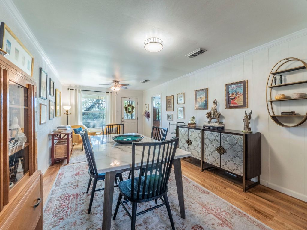 11012 3rd Street Jonestown, TX 78645 - Photo 4 of 26 a view of a dining room with furniture and a livingroom