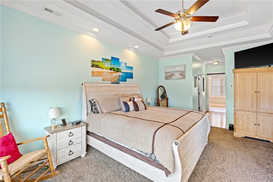 119 Turnberry Road Anderson, SC 29621 - Photo 25 of 50 This tranquil bedroom offers comfort and a tray ceiling, creating a serene personal retreat.