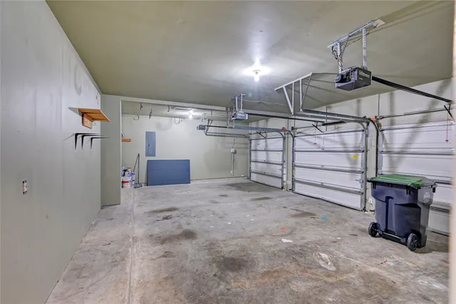 a view of a patio with couches table and chairs and potted plants