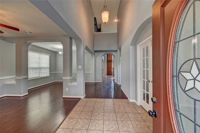 a view of gallery with wooden floor