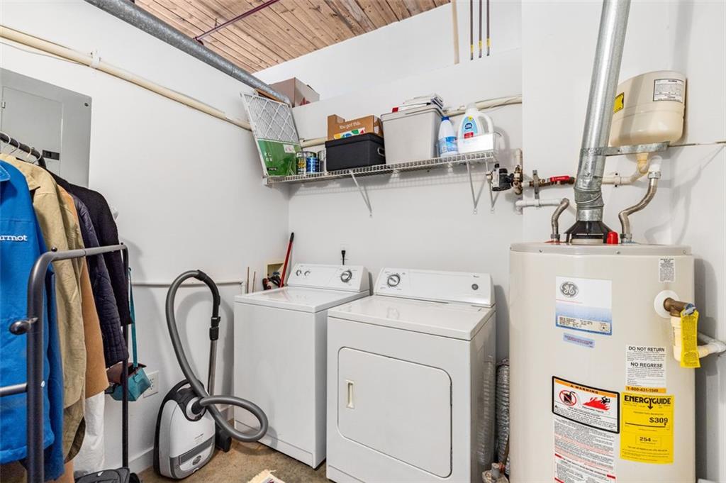 170 Boulevard Southeast, Unit 211H Atlanta, GA 30312 - Photo 27 of 49 a view of storage and utility room with washer and dryer