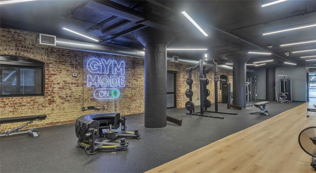 170 Boulevard Southeast, Unit 211H Atlanta, GA 30312 - Photo 30 of 49 a view of a room with gym equipment