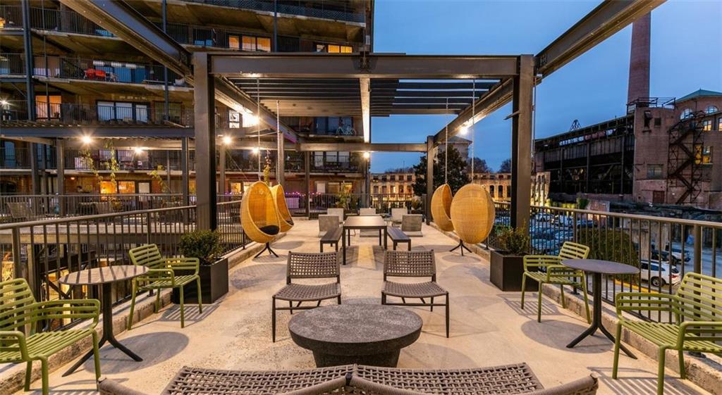170 Boulevard Southeast, Unit 211H Atlanta, GA 30312 - Photo 32 of 49 a view of a chairs and tables in patio