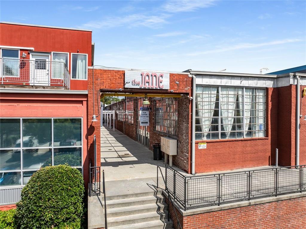 170 Boulevard Southeast, Unit 211H Atlanta, GA 30312 - Photo 47 of 49 a view of building with glass windows and door