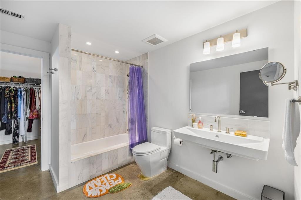170 Boulevard Southeast, Unit 211H Atlanta, GA 30312 - Photo 5 of 49 a bathroom with a sink toilet and shower
