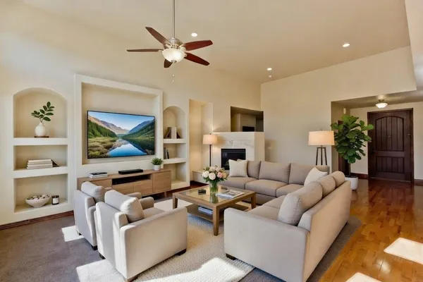 a living room with furniture and a flat screen tv