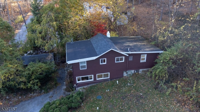 18 Decker Pond Road Vernon, NJ 07461 - Photo 6 of 40 an aerial view of a house