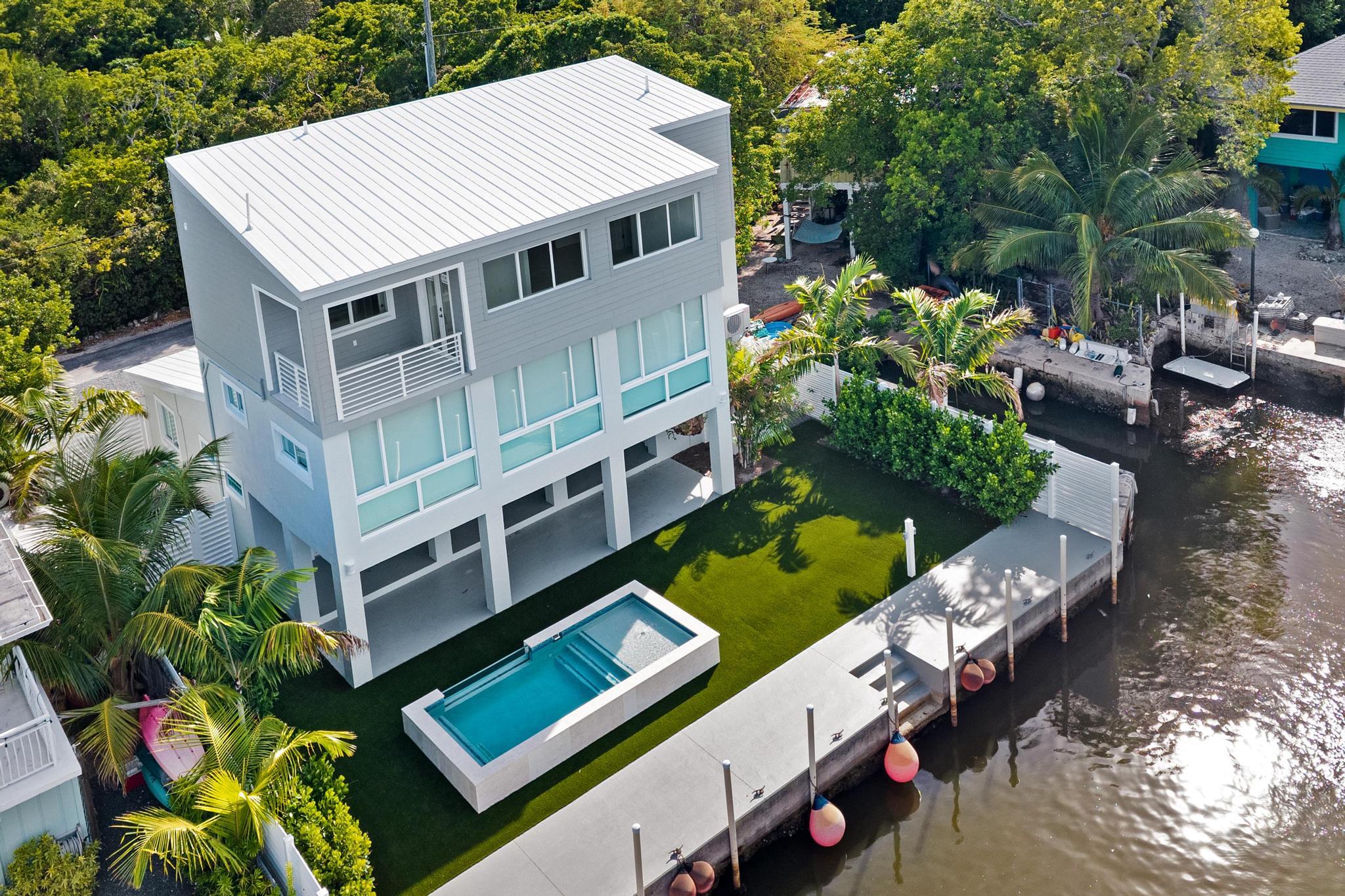 8 Poisonwood Road Key Largo, FL 33037 - Photo 4 of 83 DJI_20260630052431_0097_D