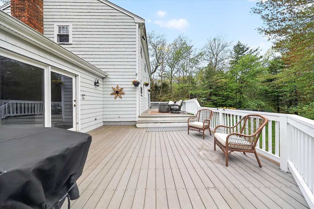 59 First Parish Road Norwell, MA 02061 - Photo 29 of 37 a balcony with wooden floor and furniture