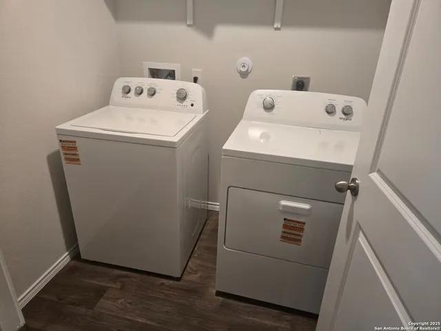 a utility room with dryer and washer