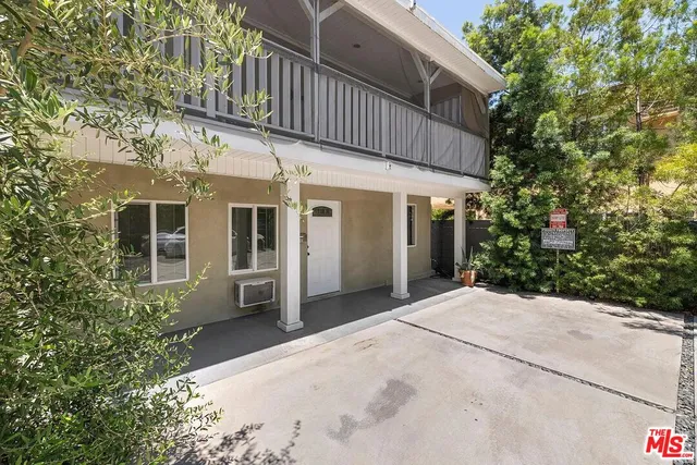a view of a house with a patio