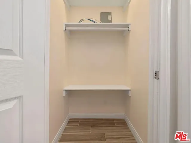 a view of staircase with white walls