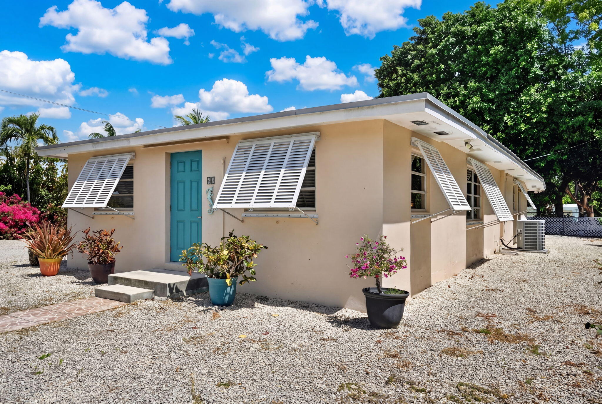 40 Transylvania Avenue Key Largo, FL 33037 - Photo 5 of 53 side view of house