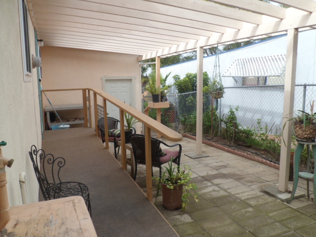225 Knoll Road Vista, CA 92083 - Photo 22 of 24 Side patio with ramp