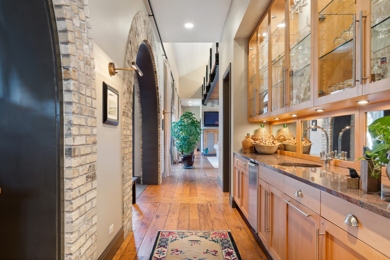 96 Ronan Road Highwood, IL 60040 - Photo 12 of 33 a hallway with a kitchen view and a stove
