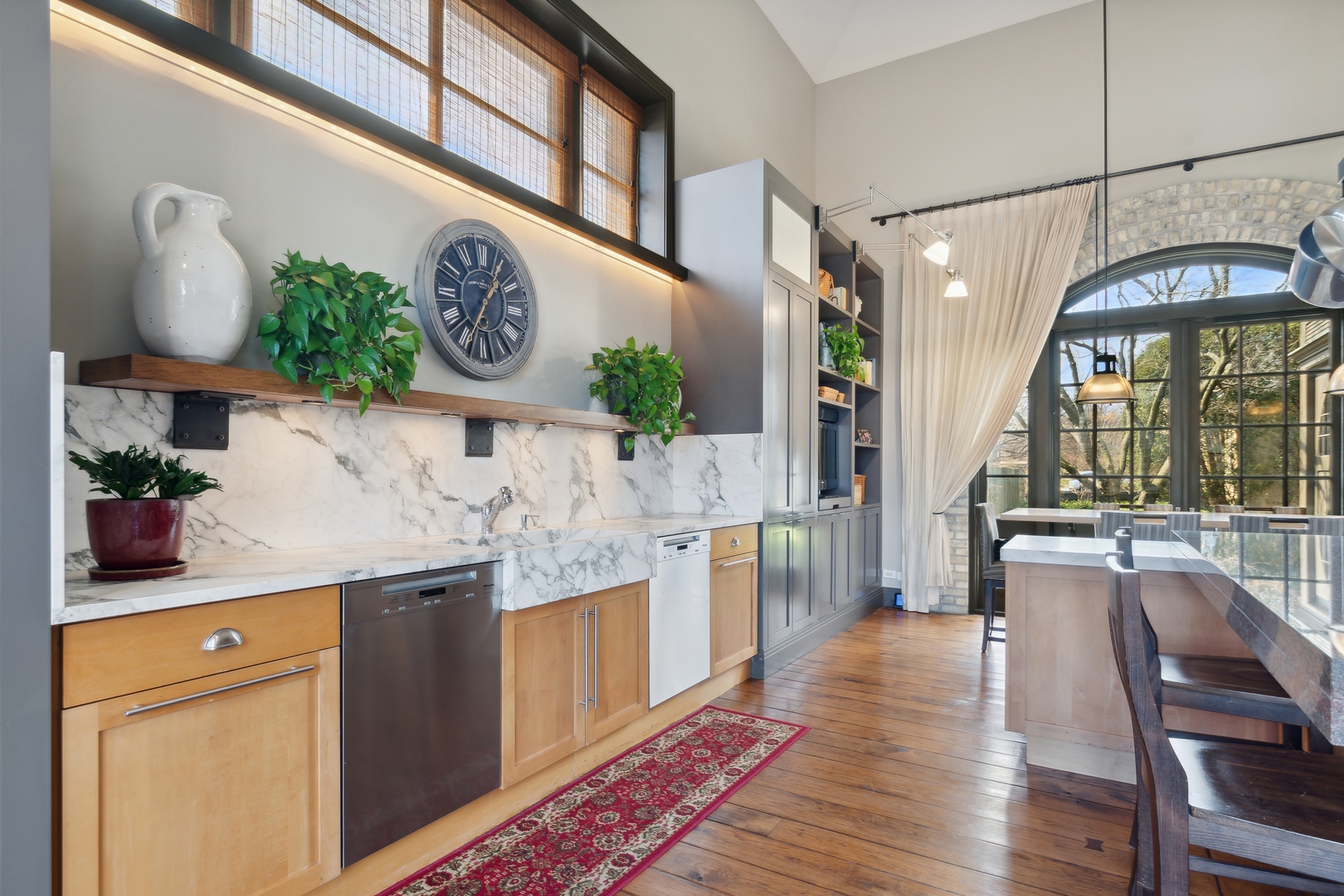 96 Ronan Road Highwood, IL 60040 - Photo 17 of 33 a kitchen with stainless steel appliances granite countertop a stove and cabinets