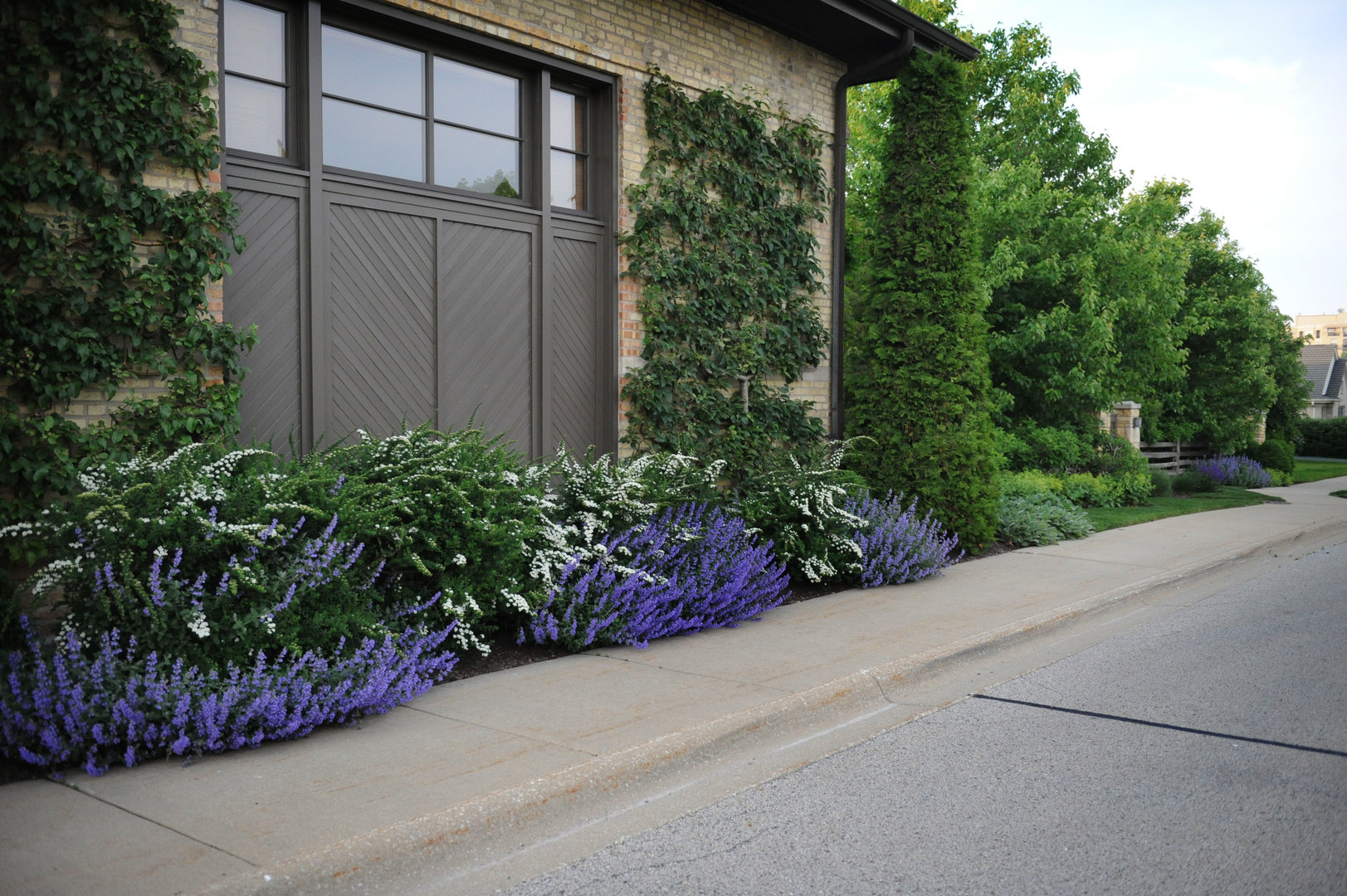 96 Ronan Road Highwood, IL 60040 - Photo 2 of 33 a view of a garden with potted plants