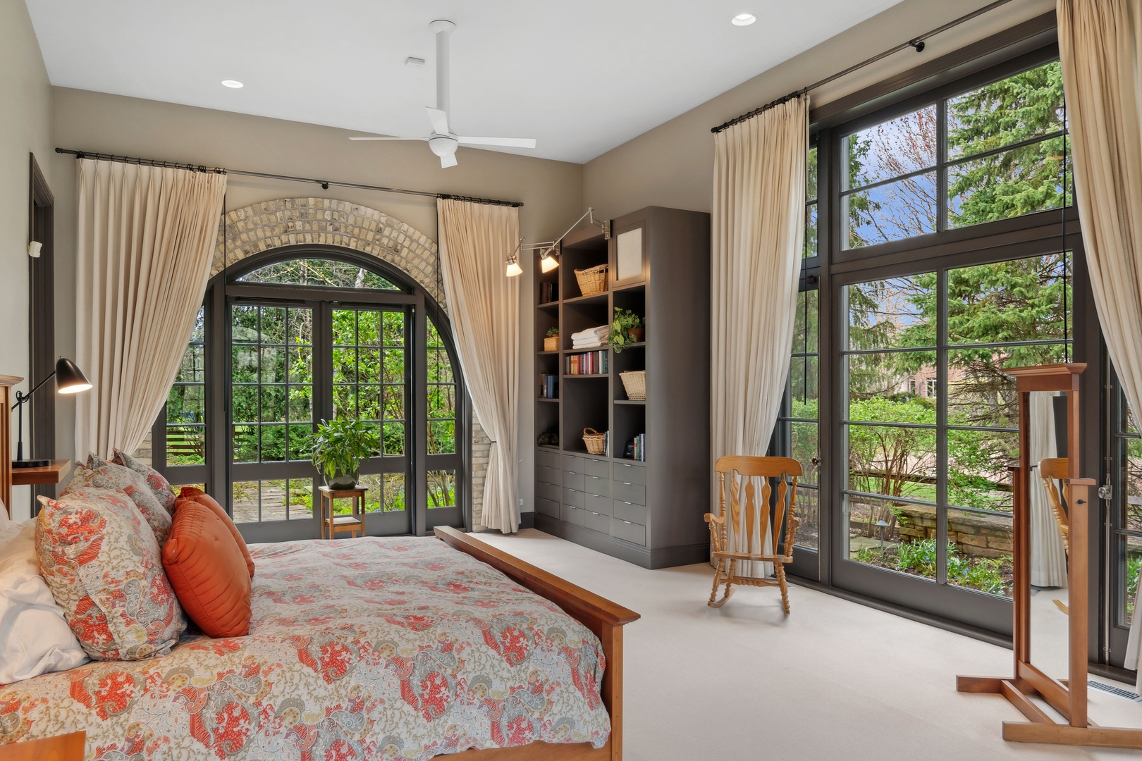 96 Ronan Road Highwood, IL 60040 - Photo 25 of 33 a bedroom with a bed and large windows