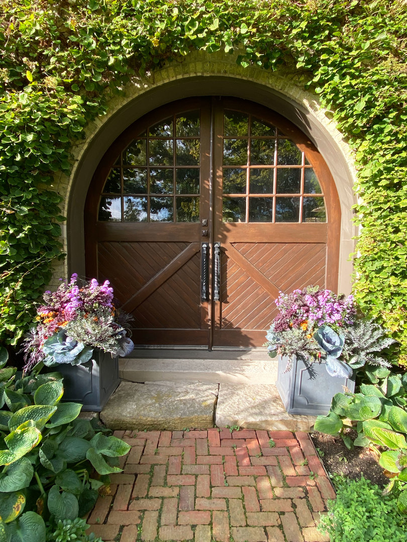 96 Ronan Road Highwood, IL 60040 - Photo 3 of 33 a front view of a house with a flower garden