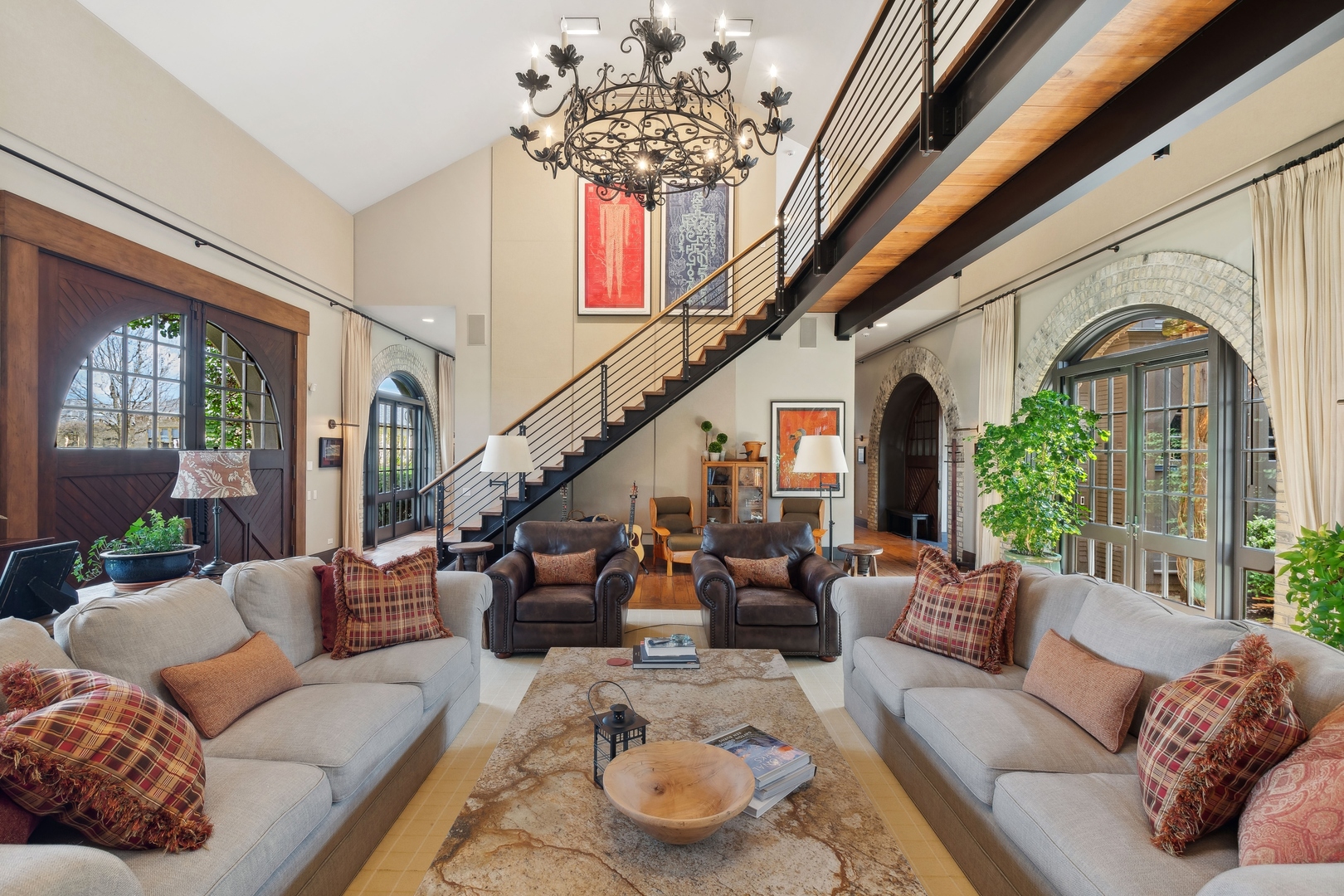 96 Ronan Road Highwood, IL 60040 - Photo 8 of 33 a living room with furniture and a chandelier