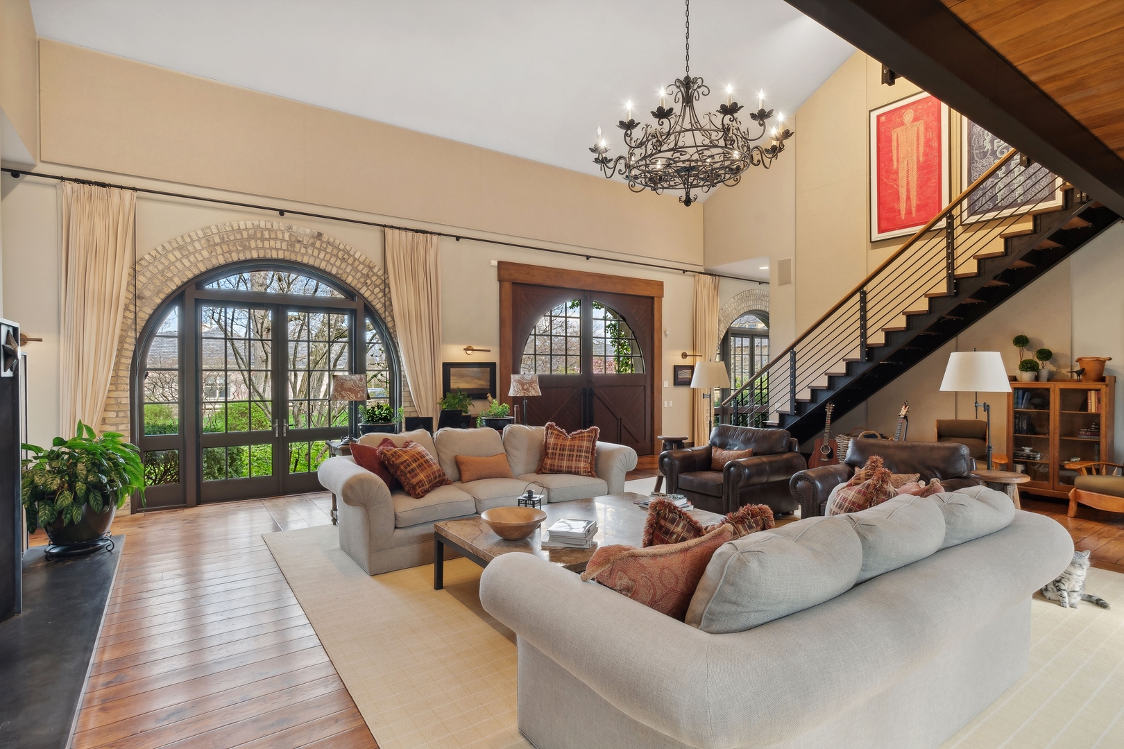 96 Ronan Road Highwood, IL 60040 - Photo 10 of 33 a living room with furniture and a chandelier