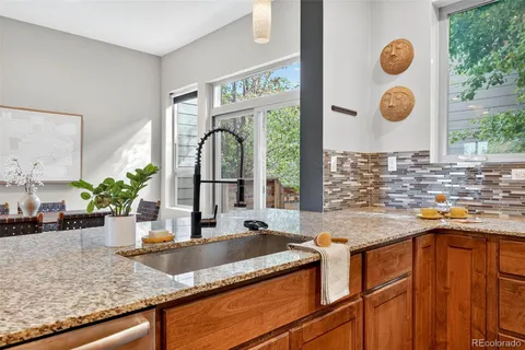 a living room with furniture and a gate