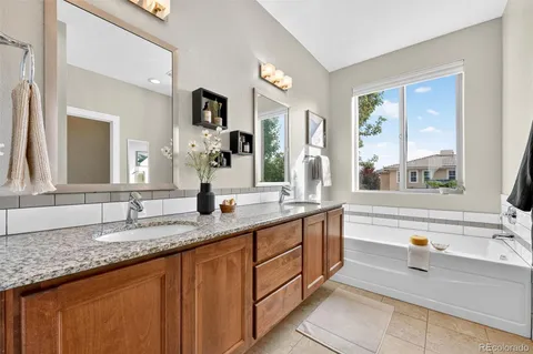 an aerial view of a house with a garden