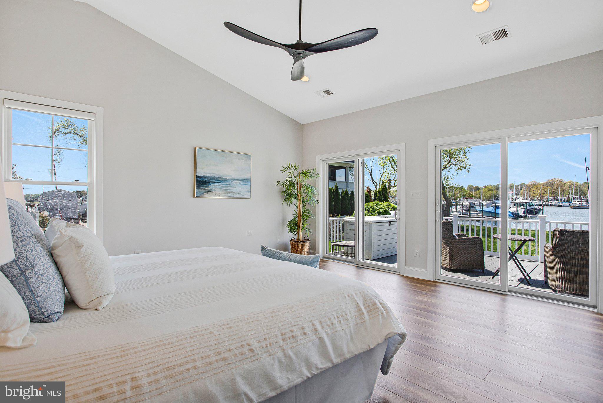 6146 Drum Point Road Deale, MD 20751 - Photo 41 of 75 a spacious bedroom with a large bed and a view of bedroom