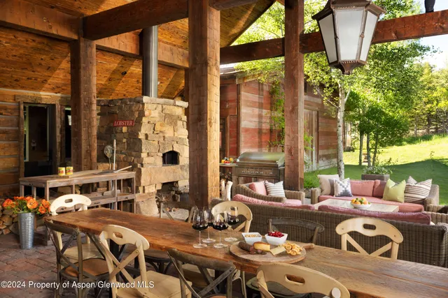 a view of balcony with furniture and a window