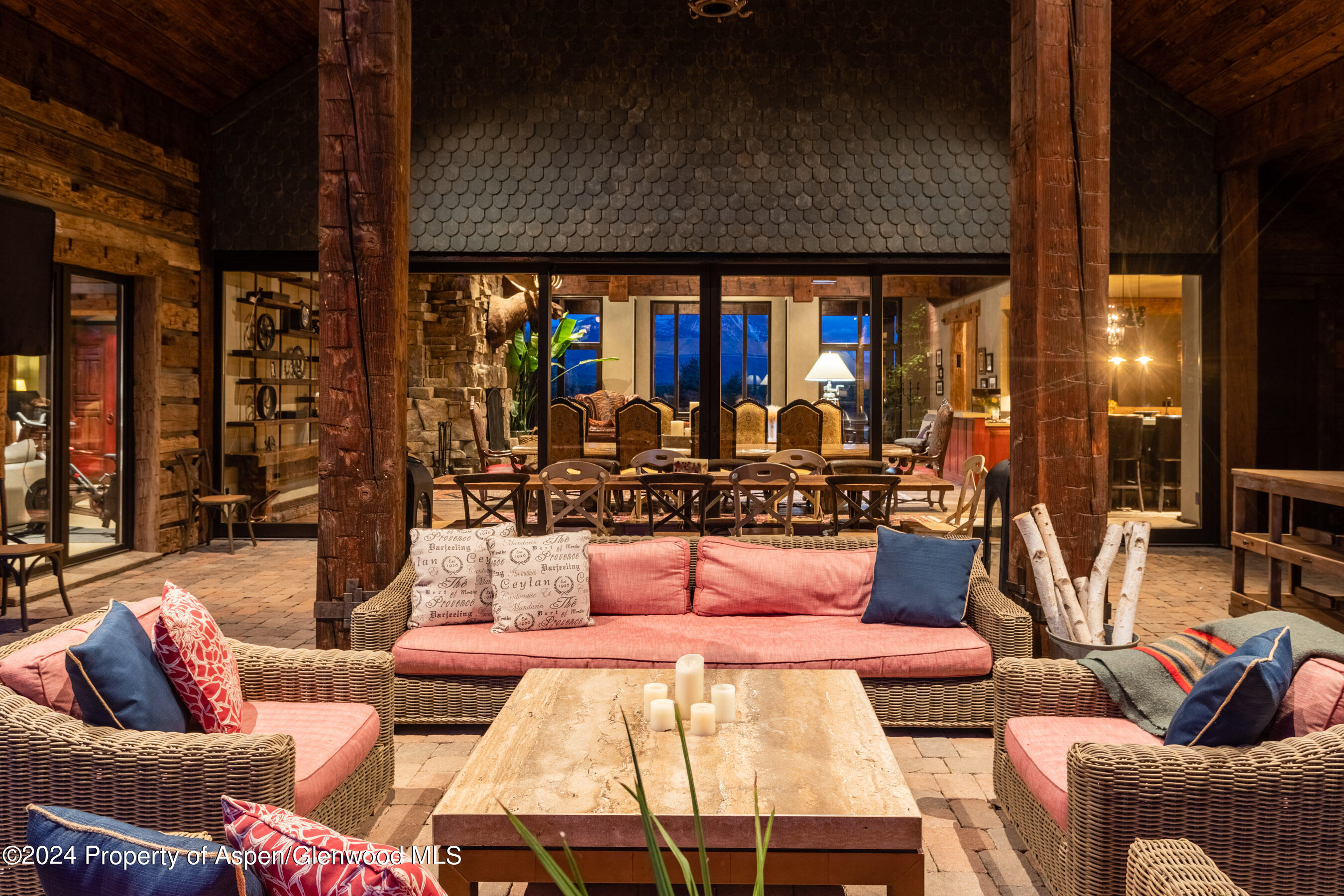 665 Callicotte Ranch Drive Carbondale, CO 81623 - Photo 6 of 39 a outdoor living area with furniture and a large window
