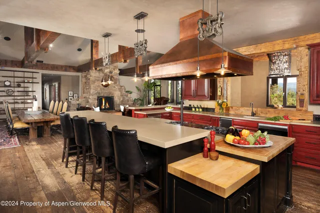 a outdoor dining space with furniture and kitchen view