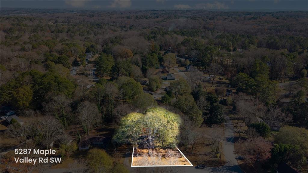5287 Maple Valley Road Southwest Mableton, GA 30126 - Photo 28 of 29 an aerial view of a house with a yard