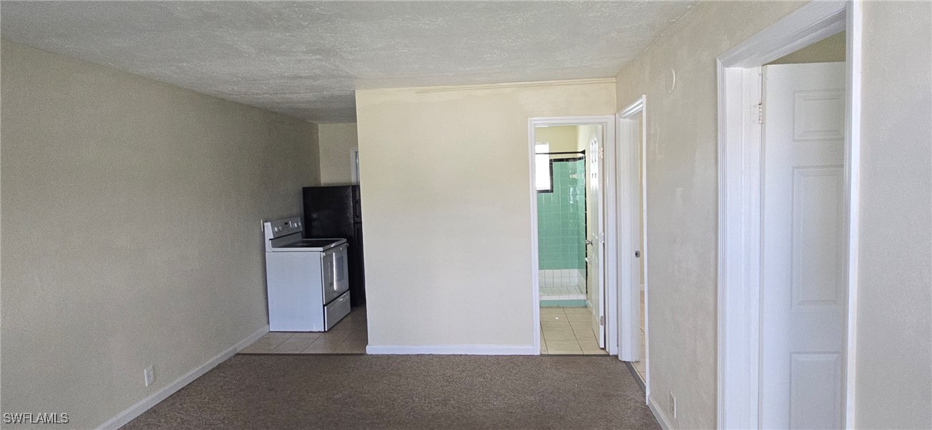 3049 2nd Street, Unit 1 Fort Myers, FL 33916 - Photo 14 of 15 a view of a room with a hallway