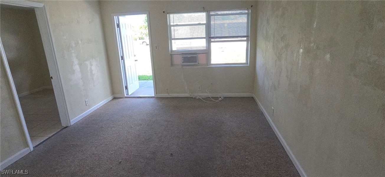 3049 2nd Street, Unit 1 Fort Myers, FL 33916 - Photo 10 of 15 an empty room with windows