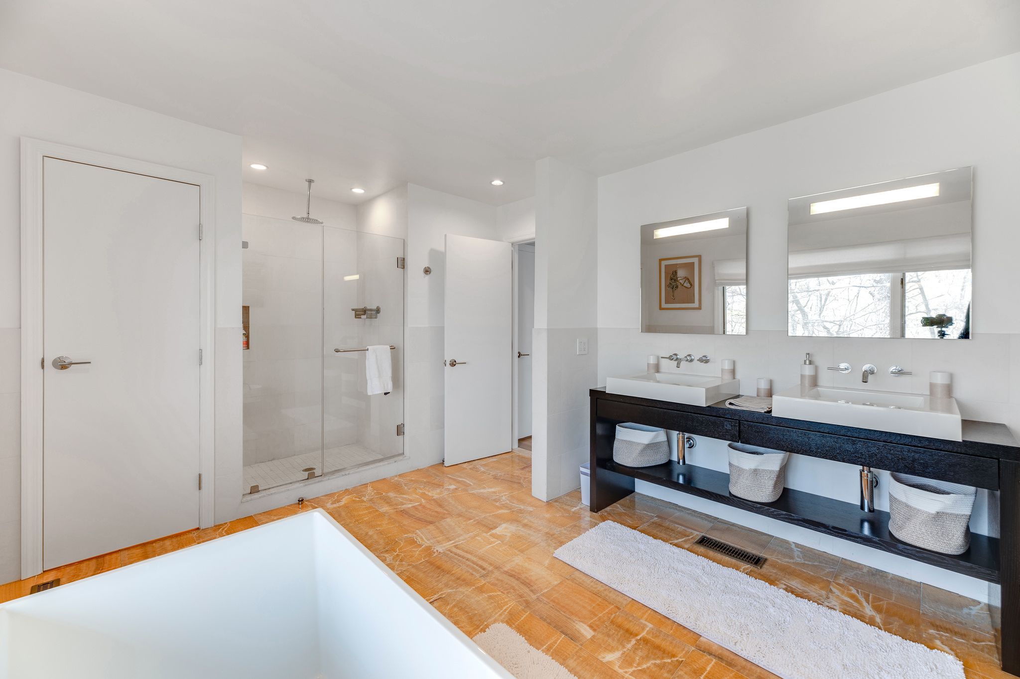 249 Roses Grove Road Water Mill, NY 11976 - Photo 12 of 21 a spacious bathroom with a shower tub and sink