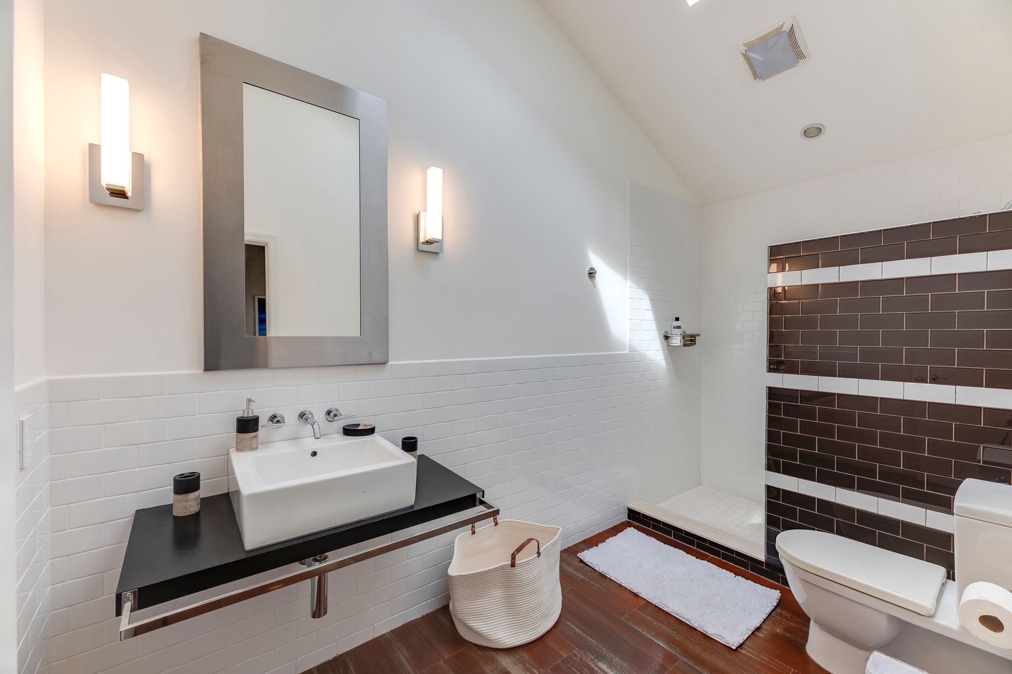 249 Roses Grove Road Water Mill, NY 11976 - Photo 17 of 21 a bathroom with a sink toilet and mirror